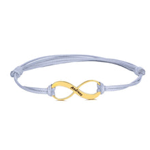 Lade das Bild in den Galerie-Viewer, Infinity Armband mit Unendlichkeitszeichen und Gravur jouelei Gold Blau